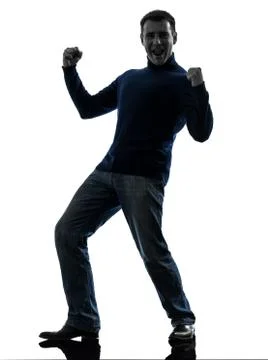 Man happy strong victorious silhouette full length Stock Photos