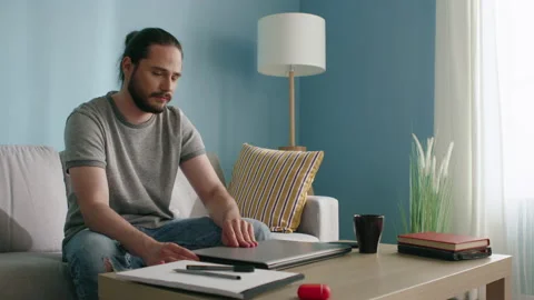 Man is Happy to Work Remotely Stock Footage 130448730