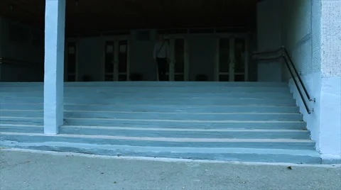 The man is happy,leaving the school Stock Footage 68612902