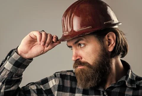 Man in hard hat. engineer in working. construction worker wear safety helmet Stock Photos