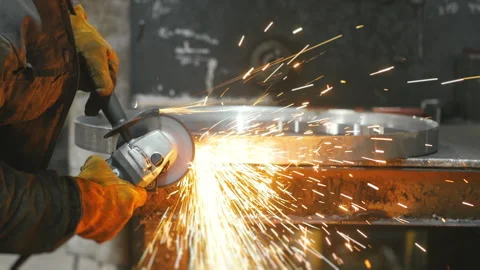 Man hard worked over the steel at factory. Stock Footage 306541562