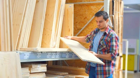 Man in hardware store Stock Footage 90460612