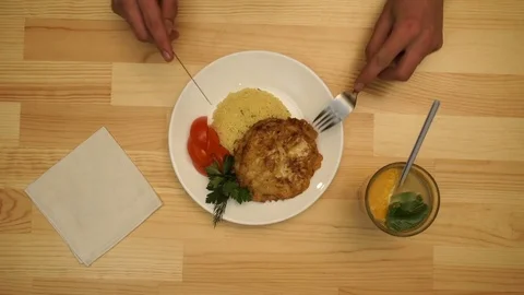 The man has dinner in the cafe. top view 库存影片 70665830