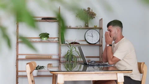 The man has eye strain from computer work. Video stock 310292555