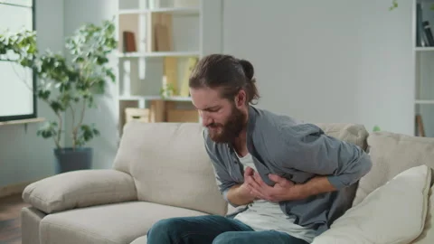 Man has Got the Symptoms of Heart Attack. Breathing Problems, Chest Pain. Stock Footage 262114465