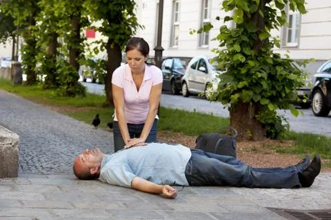 Man has heart attack or stroke Stock Photos