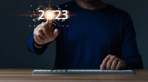 Man has idea plan management money in 2023. Person businessman has goal to .. Stock Photos