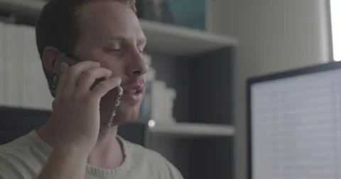 Man has negative conversation on phone Video stock 78037407