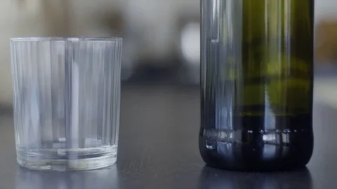 Man Has a Problem With Alcohol. Wine is Poured Into a Glass. 動画素材 71841305