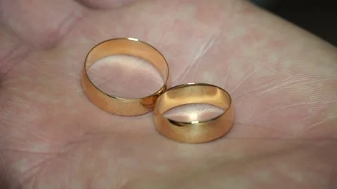 The man has two wedding rings on his hand Stock Footage 238020483