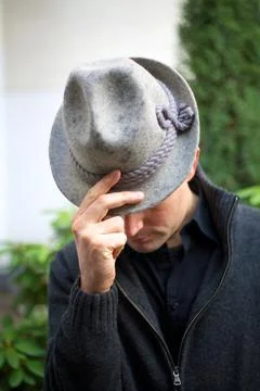 Man with Hat Bowing 库存照片