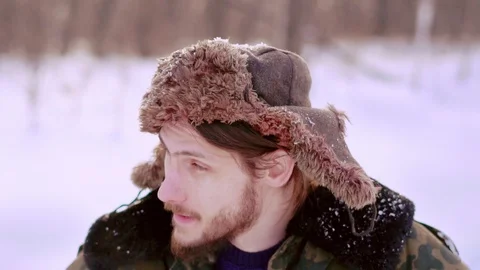 The man in the hat with earflaps Stock Footage 104950666