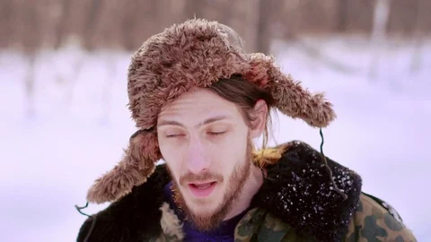 The man in the hat with earflaps Stock Footage 112486160