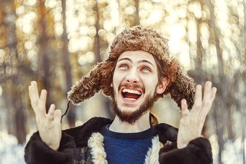 The man in the hat with earflaps Stock Photos