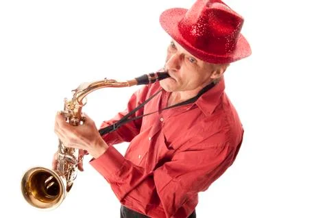 Man with hat playing saxophone Stock Photos