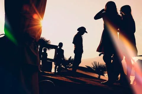 A man with hat with sun rays Stock Photos