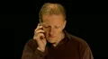Man having an angry telephone conversation HD Footage