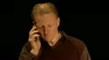 Man having an angry telephone conversation HD Footage