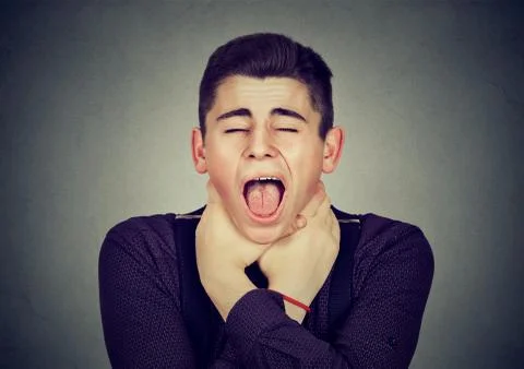 Man having asthma attack or choking can't breath Stock Photos