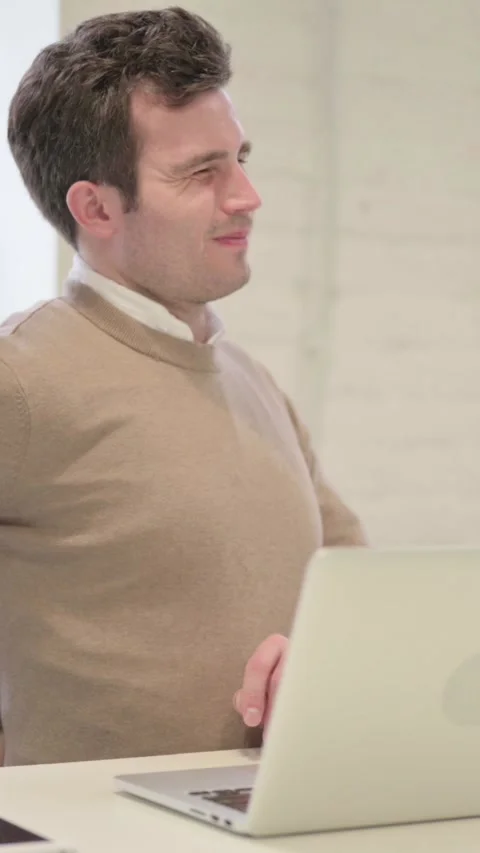 Man having Back Pain while using Laptop in Office, Vertical Video Stock Footage 337351102