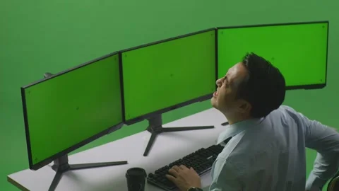 Man Having Backache While Working With Mock Up Multiple Computer Monitor Stock Footage 249634687