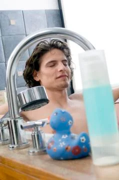 Man having a bath Stock Photos