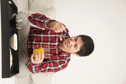 Man having a breakfast Stock Photos