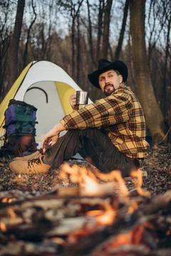 Man having camping at forest Stock Photos