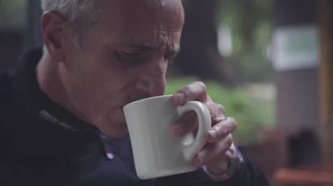 Man having a coffee in cafe Stock Footage 63465324