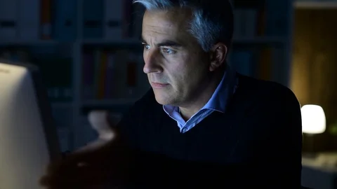Man having computer problems late at night Stock Footage 89197312