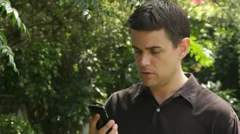 Man Having a Conversation on his Smart Phone Stock Footage 11237766