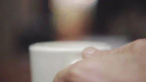Man having cup of coffee in cafe Stock Footage 63464657