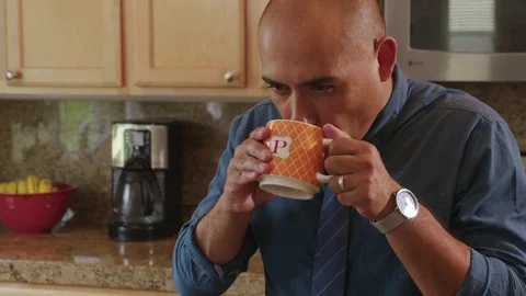 Man having a cup of coffee Stock Footage 83189271