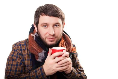 Man having cup of tea on white background Stockfoto's