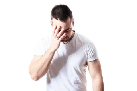 A man having a disturbing problem over white Stock Photos
