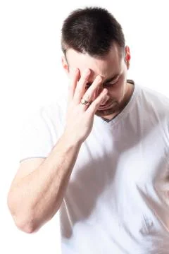 A man having a disturbing problem over white Stock Photos