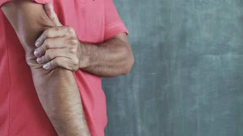 Man having elbow pain at arm Stock Footage 137136083