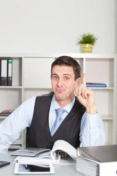 Man having a eureka moment as he solves a problem Stock Photos