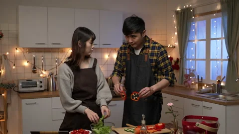 Man having fun with food slice with girlfriend Stock Footage 168783903
