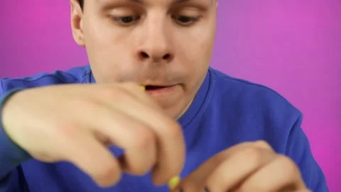 A man is having fun with fries. Stock Footage 160278207