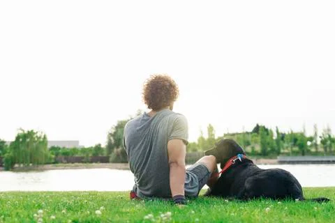 Man having fun with his dog. Stock Photos