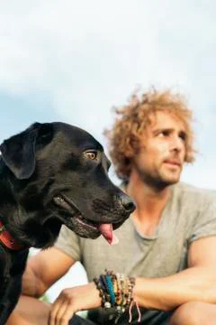 Man having fun with his dog. Stock Photos