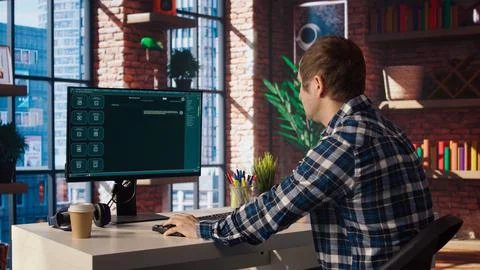 Man having fun interacting with AI LLM chatbot PC GPT software on PC Stock Photos