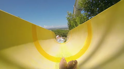 Man having fun, sliding at water park Stock Footage 64151300