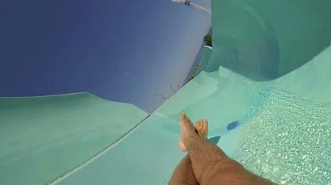 Man having fun, sliding at water park Stock Footage 64151618