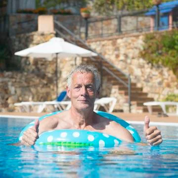 Man having fun at vacation Stock Photos