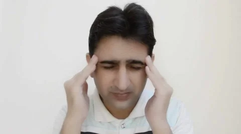 Man having headache Stock Footage 66990313