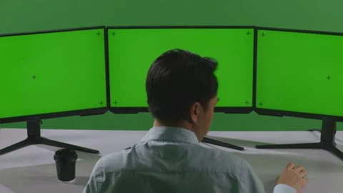 Man Having Headache While Working With Mock Up Multiple Computer Monitor Stock Footage 249633656