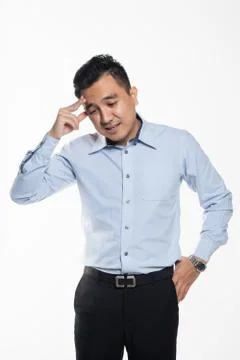 Man having headache at work Stock Photos