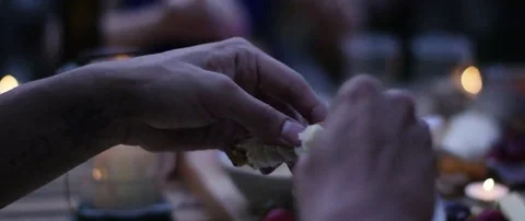 Man having outdoors dinner with group of friends Stock Footage 69201197
